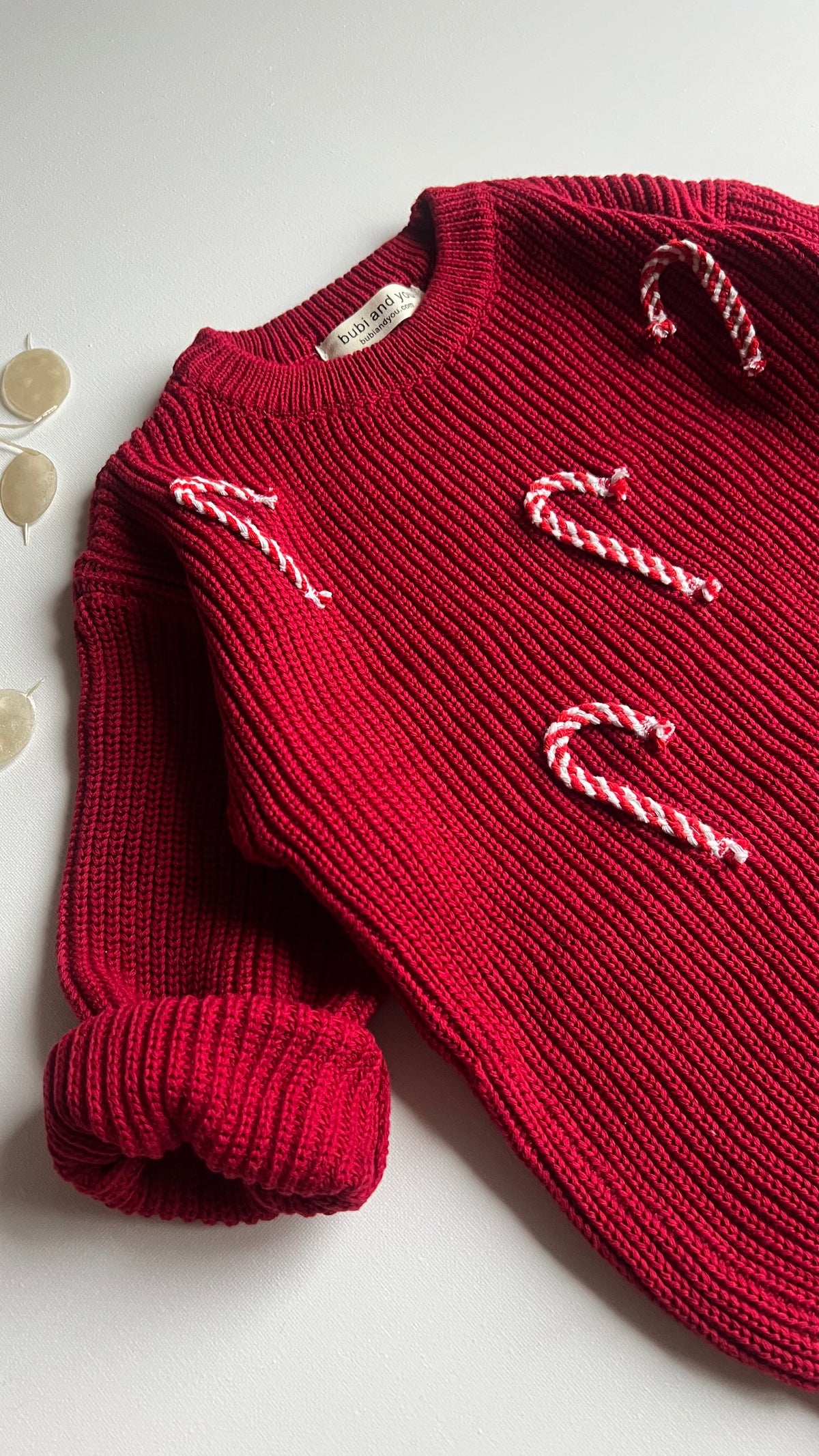 Roter Weihnachtspullover mit Zuckerstangen für Babys, Kinder und Erwachsene