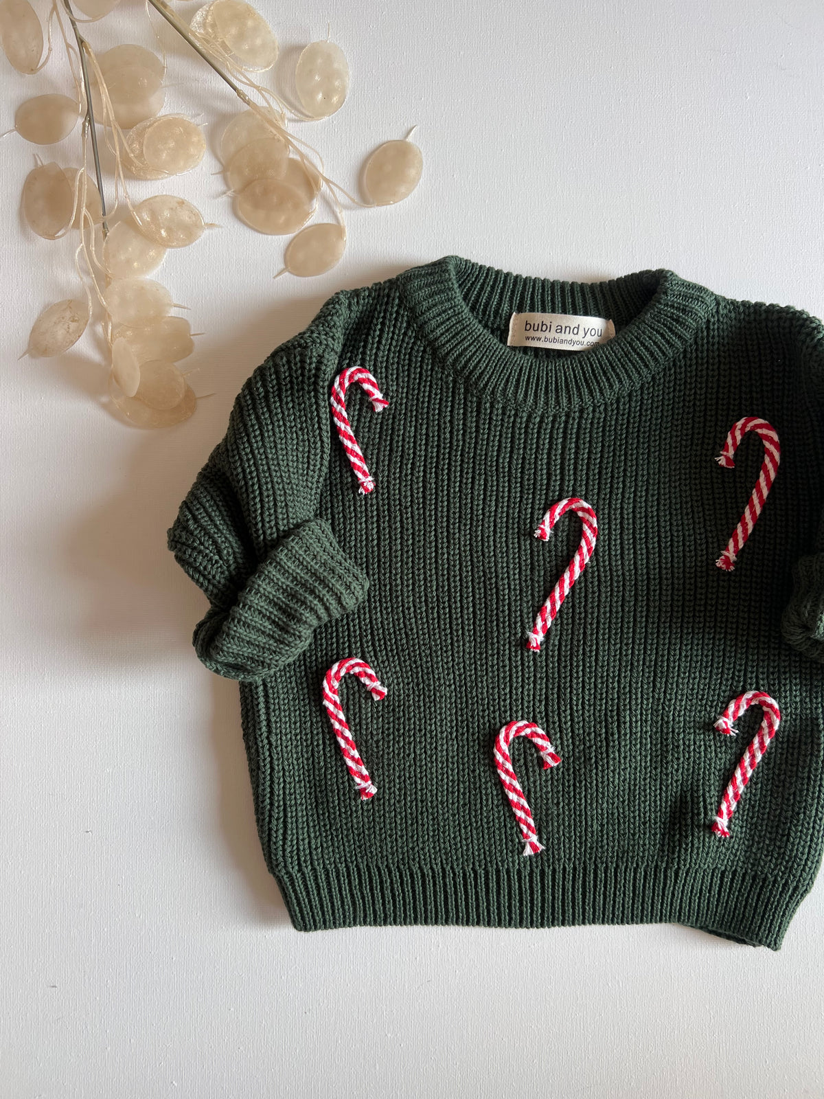 Smaragdgrüner Weihnachtspullover mit Zuckerstangen für Babys, Kinder und Erwachsene